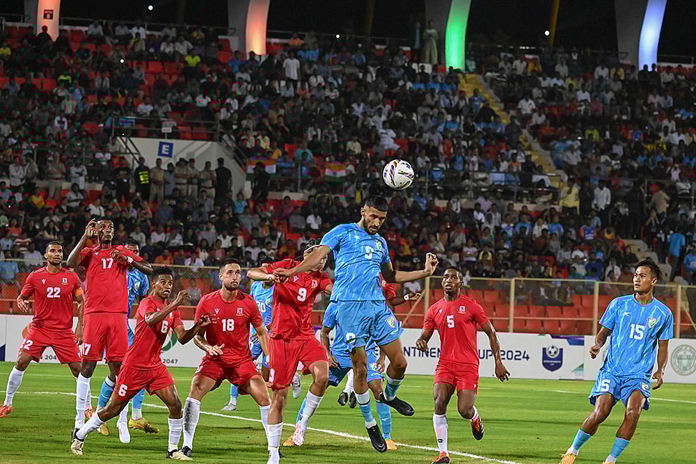 | Photo: PTI : India Vs Mauritius: India's Manvir Singh (9) heads the ball during match against Mauritius